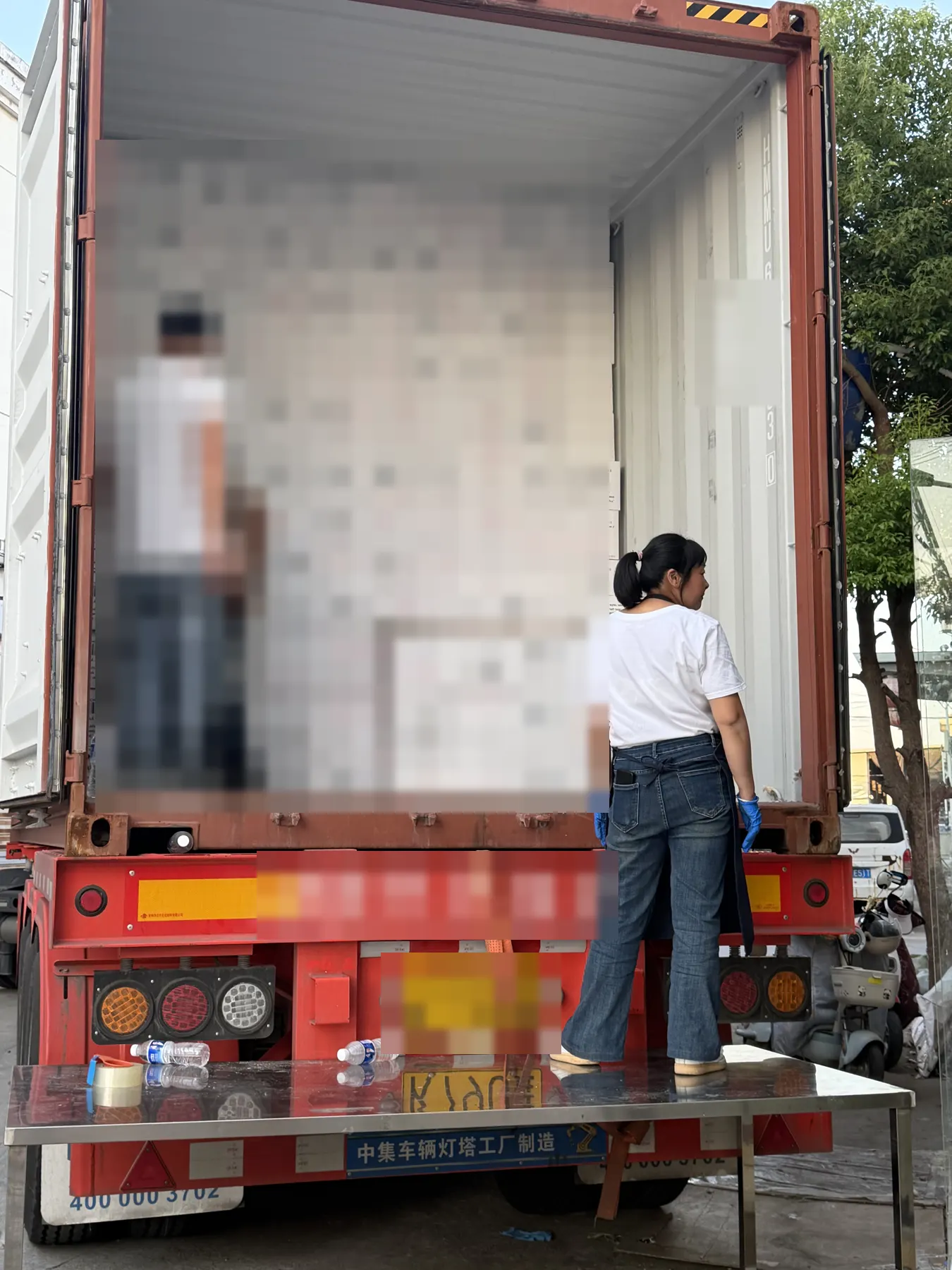 EASTGLOVES disposable glove cartons during container loading, October 2026